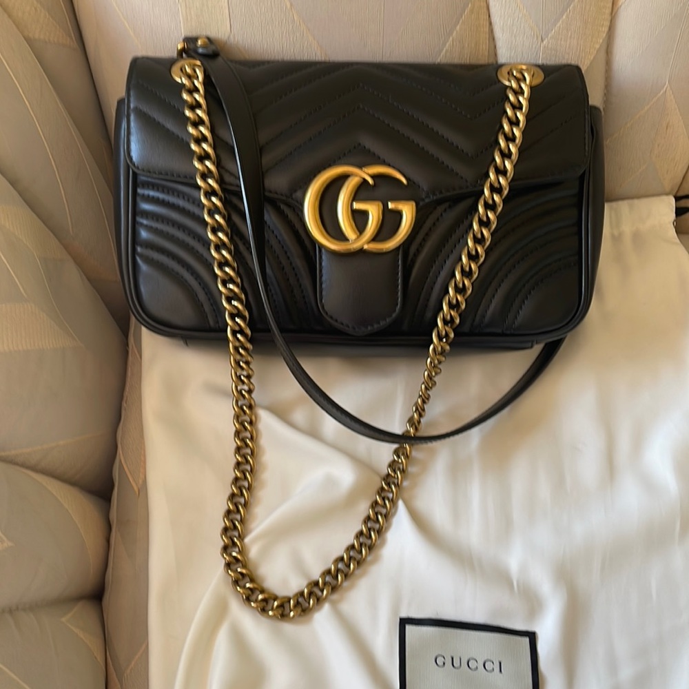 Gucci handbag black medium size from Neiman Marcus with tag and pouch